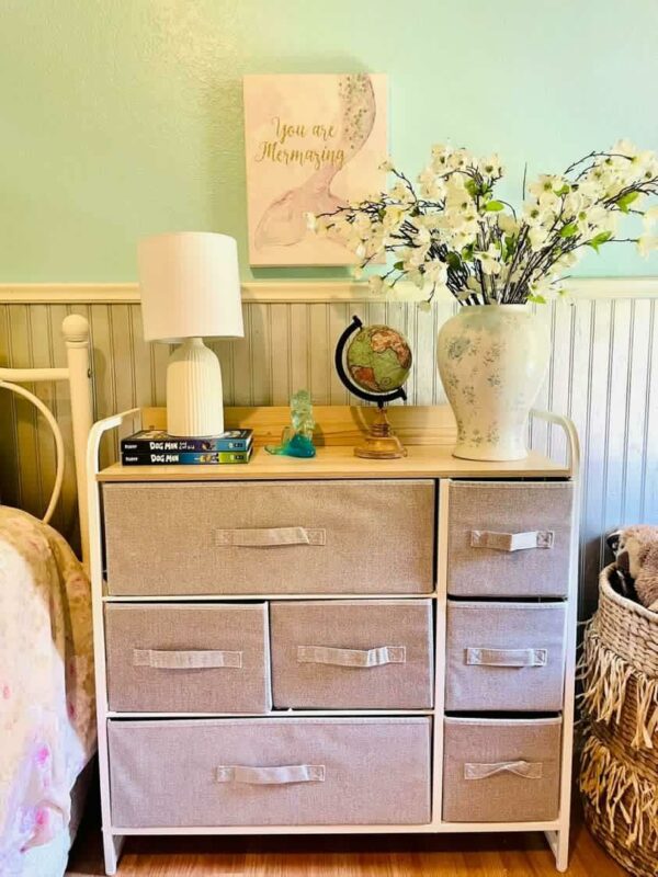 Fabric chest with 7 drawers, steel frame, and wooden top for easy, durable storage