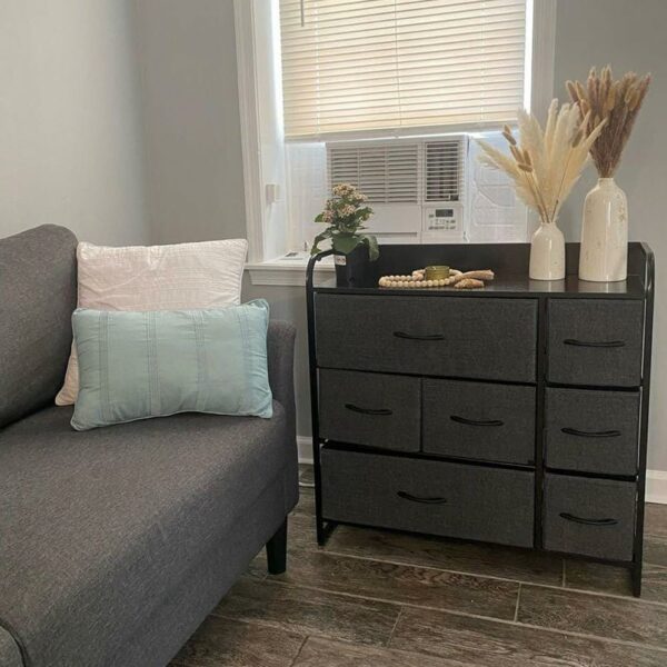 Fabric chest with 7 drawers, steel frame, and wooden top for stylish storage