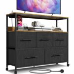 Black chest with 5 fabric drawers, charging station, storage shelf, and wheels