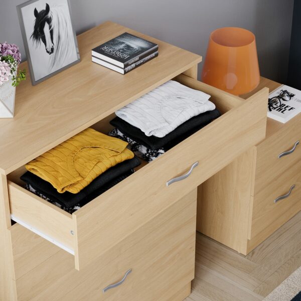 Durable chest with metal handles and anti-bowing support for bedroom storage
