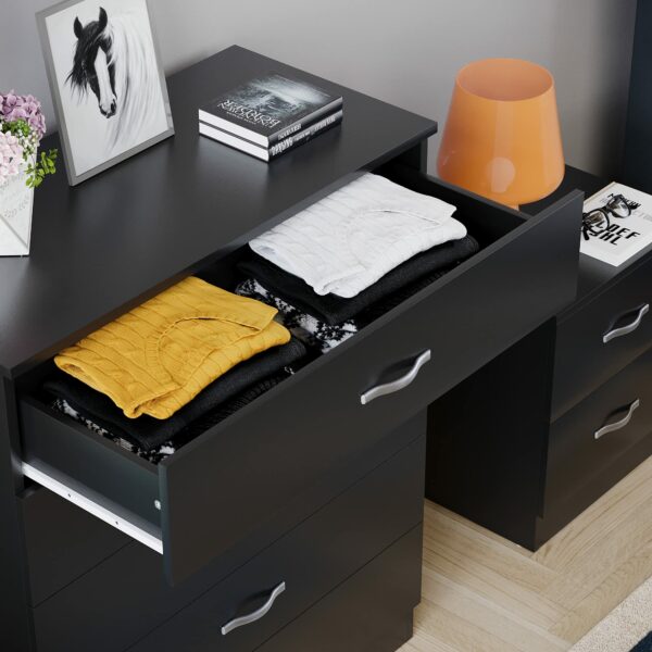 Chest of drawers with metal handles and anti-bowing support, ideal for bedroom and nursery storage