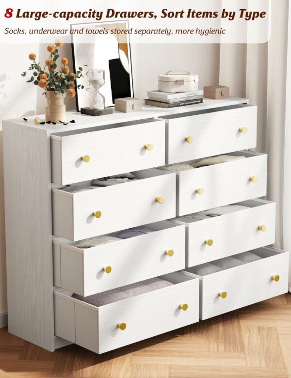 White chest of drawers with 8 fabric drawers and gold handles for elegant storage